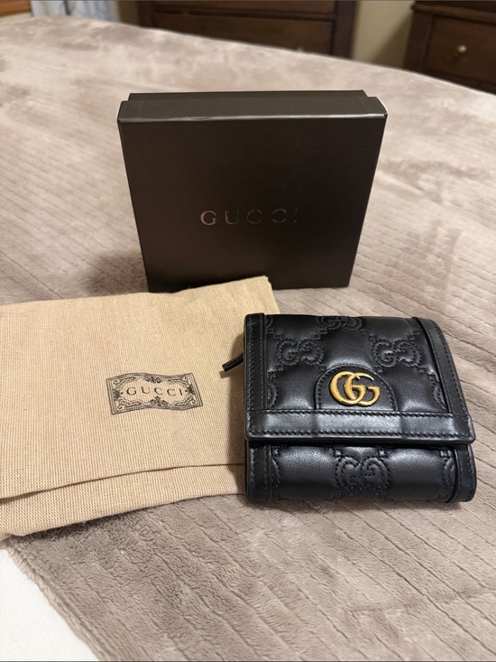 Gucci Handbags - EUC Gucci Black Quilted Gold GG Leather Wallet with dusty and Box